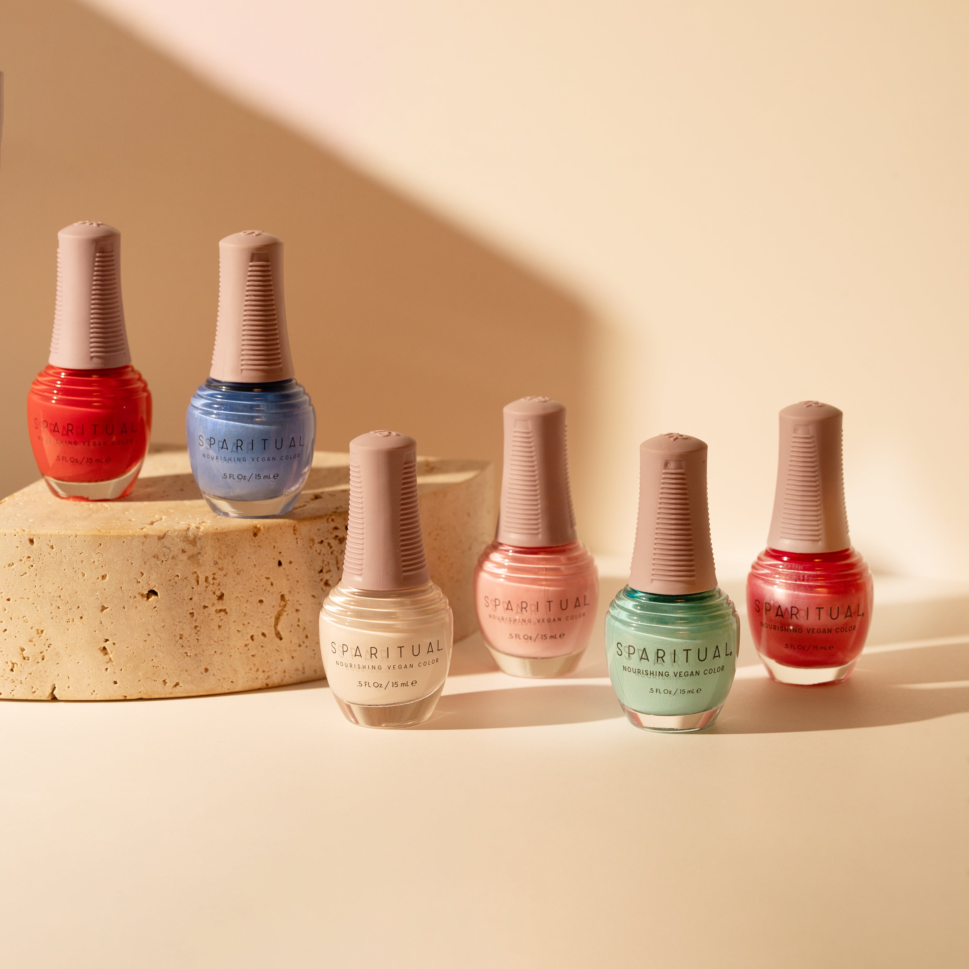 Nourishing Vegan Color collection featuring six nail polish shades. Vegan, cruelty-free, clean formula for healthy nails with 1-step application, no base or top coat needed.