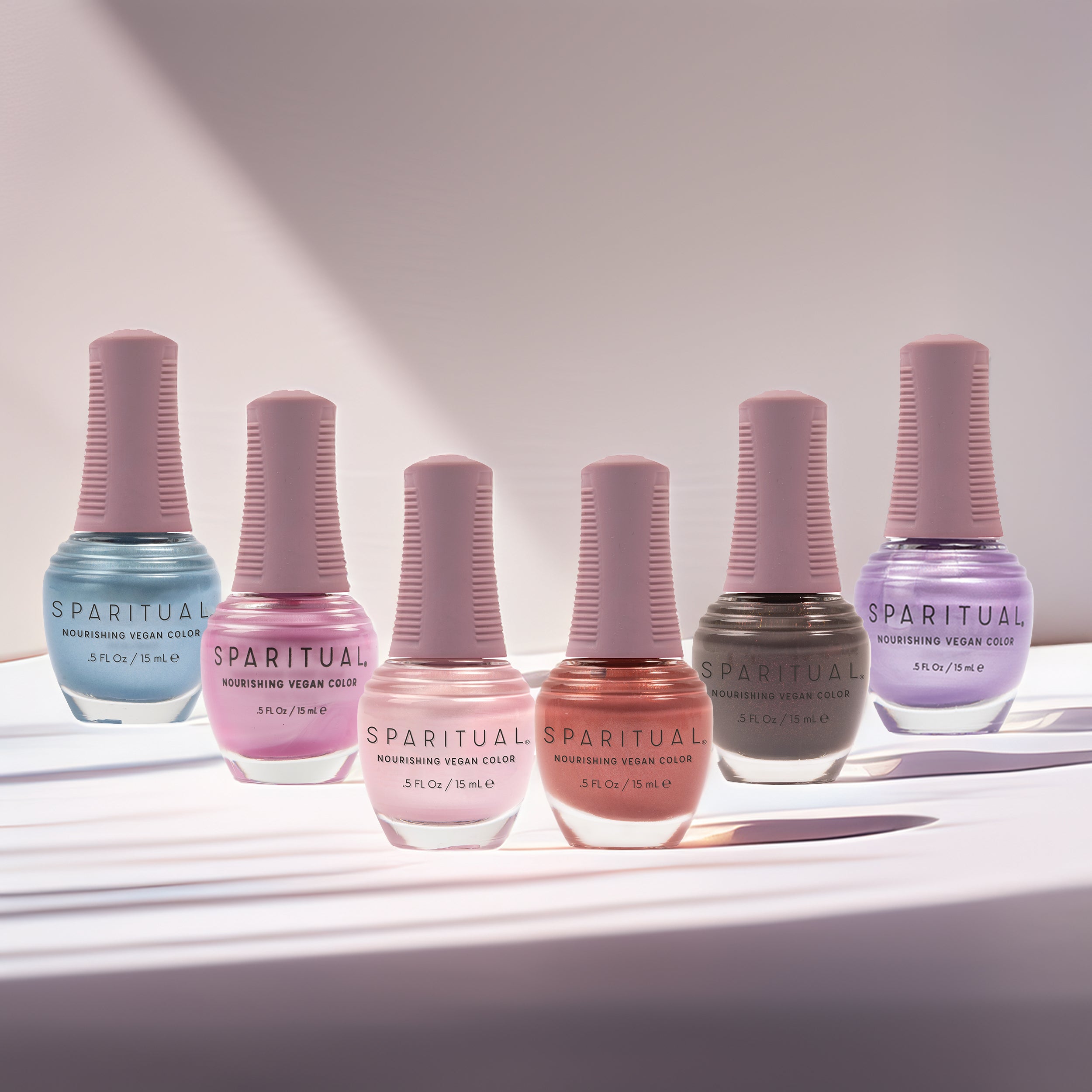 Nourishing Vegan Color collection featuring six nail polish shades. Vegan, cruelty-free, clean formula for healthy nails with 1-step application, no base or top coat needed.