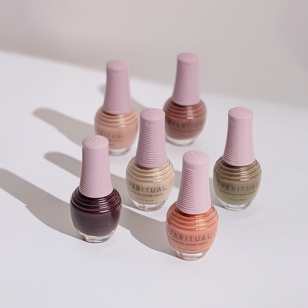 Nourishing Vegan Color collection featuring six nude, natural, neutral earth-tone nail polish shades for healthy nails with treatment and color benefits.